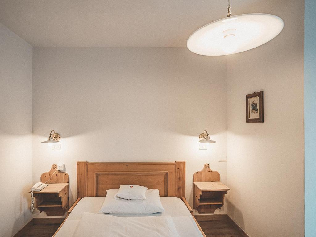 Postel nebo postele na pokoji v ubytování Hotel Turmwies
