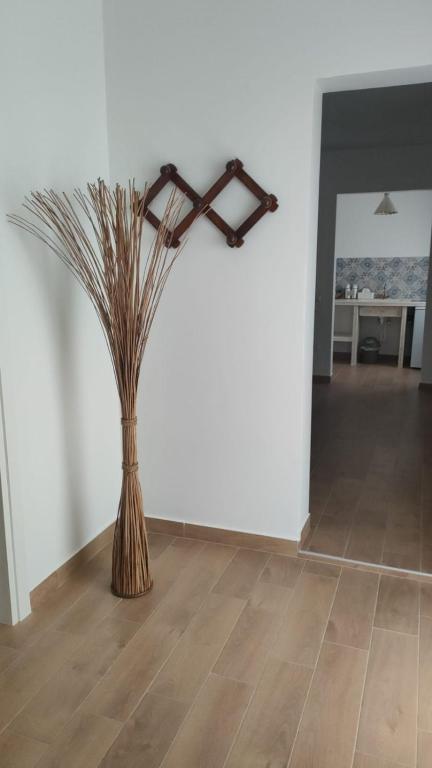 a vase sitting on the floor in a room at Lovin Puglia Vacation in Bari