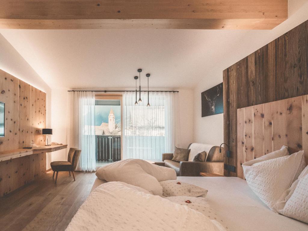 Postel nebo postele na pokoji v ubytování Hotel Turmwies