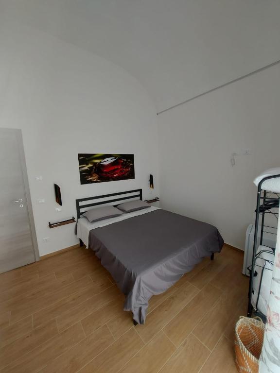 A bed or beds in a room at Struttura Le Gemme