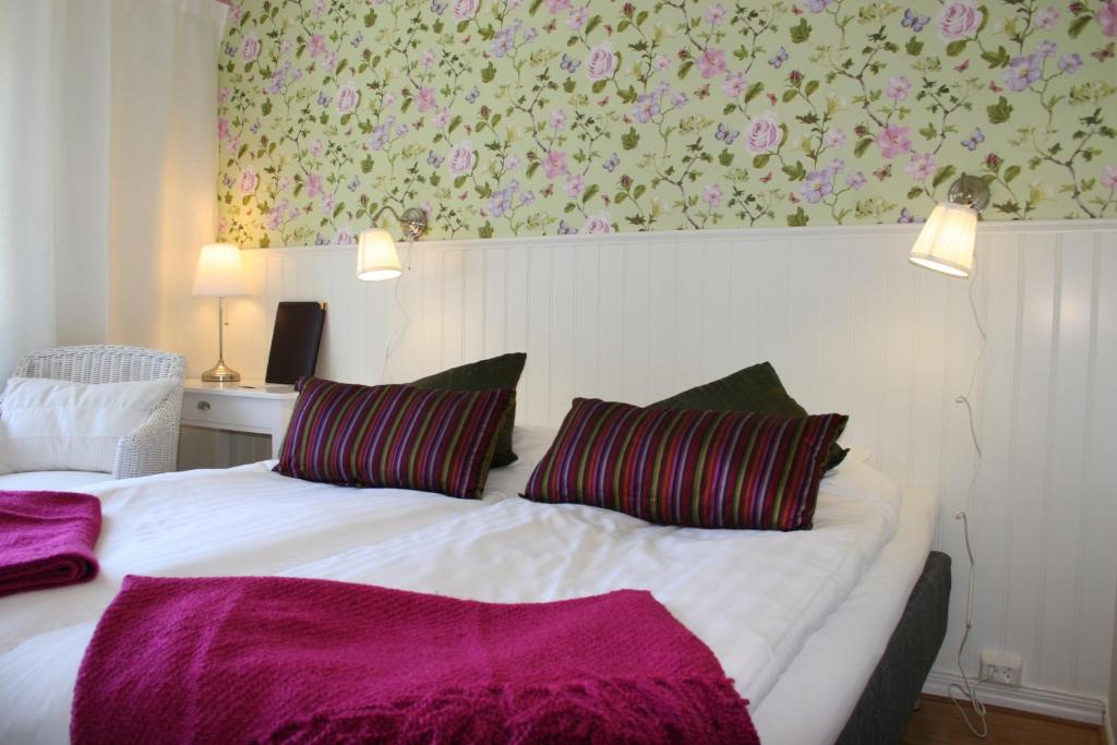 Postel nebo postele na pokoji v ubytování Nynäsgården Hotell & Konferens