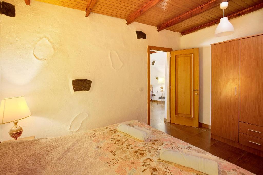 Posteľ alebo postele v izbe v ubytovaní Casa Rural Jovial