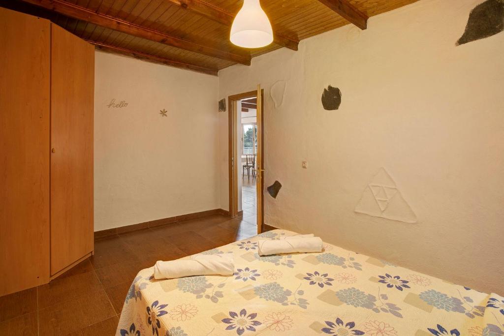 Posteľ alebo postele v izbe v ubytovaní Casa Rural Jovial
