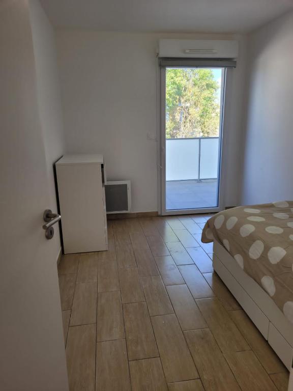 Posteľ alebo postele v izbe v ubytovaní Superbes appartements neufs à Montpellier