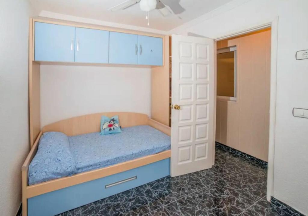 Łóżko lub łóżka w pokoju w obiekcie Lightbooking playa de Amadores La Concha