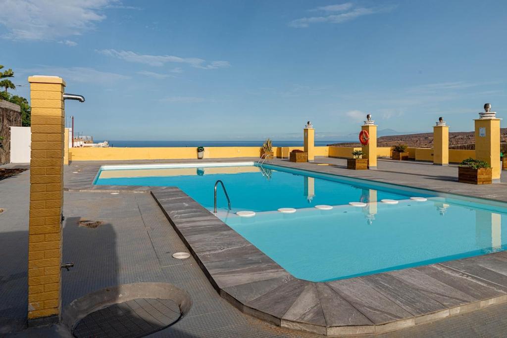 Basen w obiekcie Lightbooking playa de Amadores La Concha lub w pobliżu