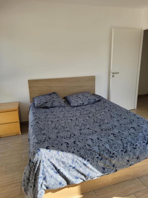 Posteľ alebo postele v izbe v ubytovaní Superbes appartements neufs à Montpellier