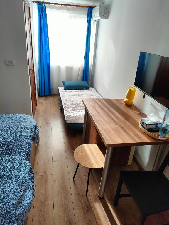 Postel nebo postele na pokoji v ubytování iVAVev Is Us byTheSea Constanta