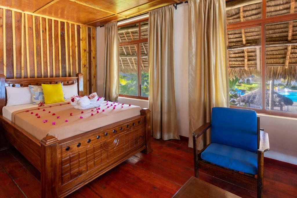 Postel nebo postele na pokoji v ubytování F-Zeen Boutique Hotel Zanzibar