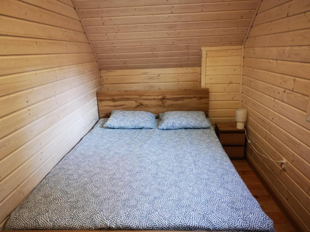 Postel nebo postele na pokoji v ubytování Domki AGA