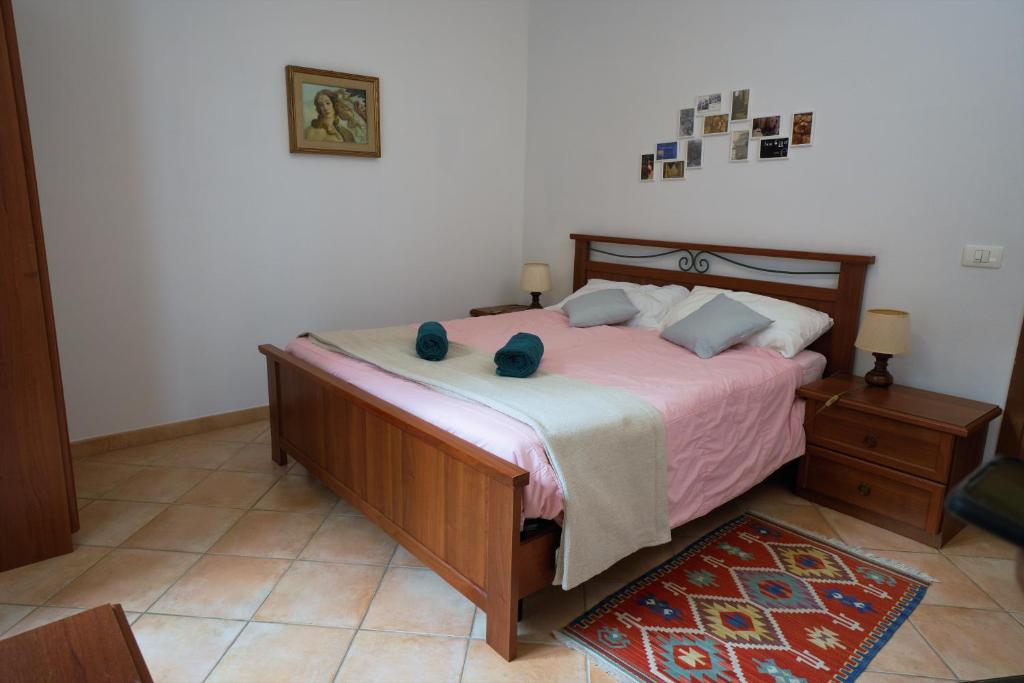 Letto o letti in una camera di U Ciousu by Ligurian Life APPARTAMENTI IN AGRITURISMO