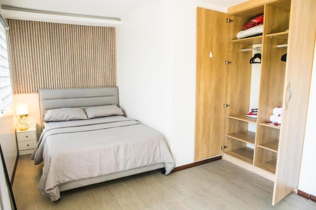 Postel nebo postele na pokoji v ubytování One Oasis 2BR Condo in Mabolo-near SM, Ayala, IT park