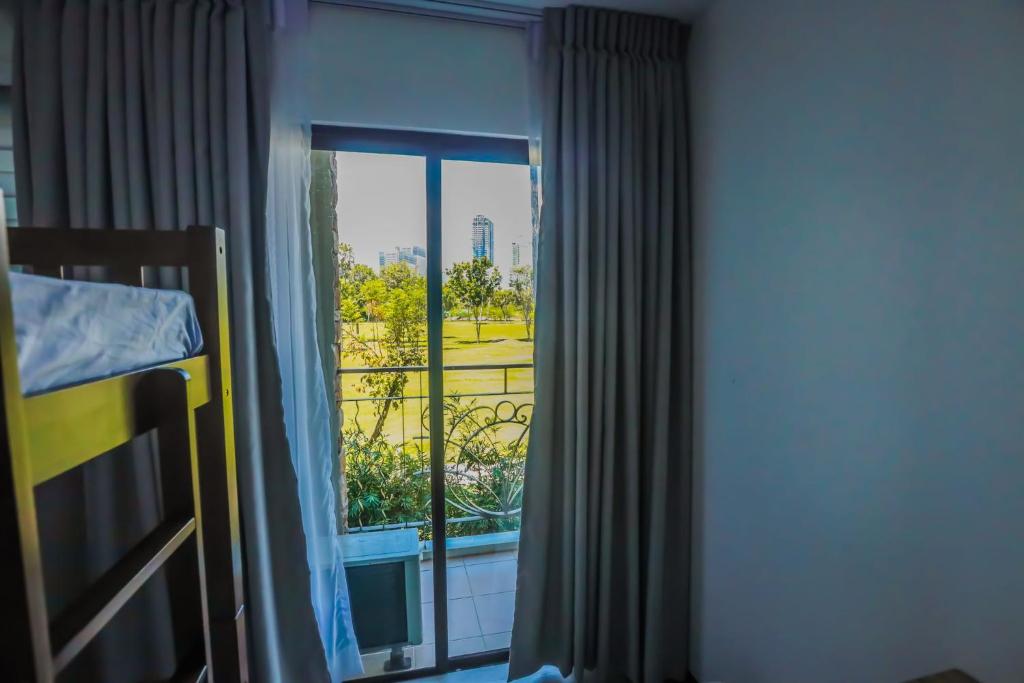 Postel nebo postele na pokoji v ubytování One Oasis 2BR Condo in Mabolo-near SM, Ayala, IT park