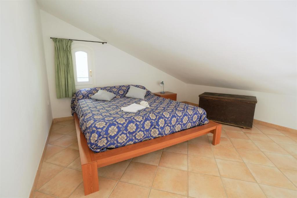 Letto o letti in una camera di U Ciousu by Ligurian Life APPARTAMENTI IN AGRITURISMO