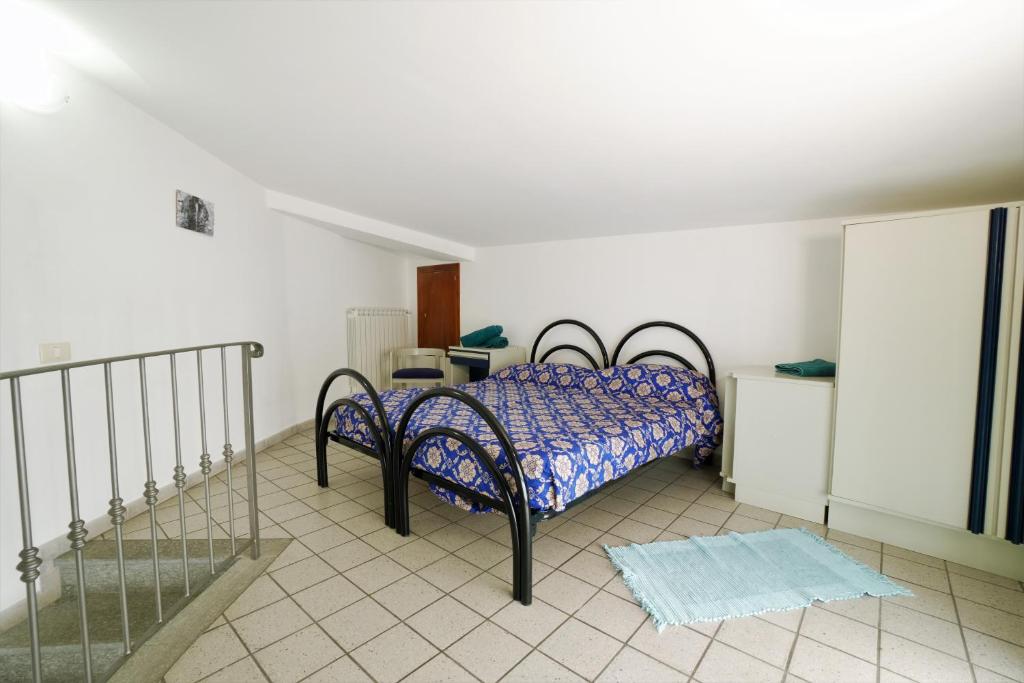 Letto o letti in una camera di U Ciousu by Ligurian Life APPARTAMENTI IN AGRITURISMO