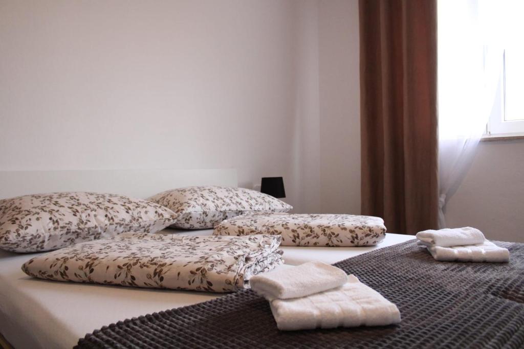 Postel nebo postele na pokoji v ubytování Apartman Villarossa