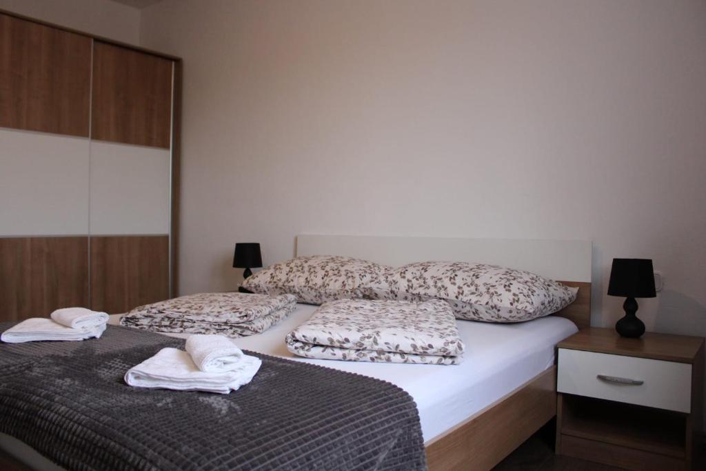 Postel nebo postele na pokoji v ubytování Apartman Villarossa