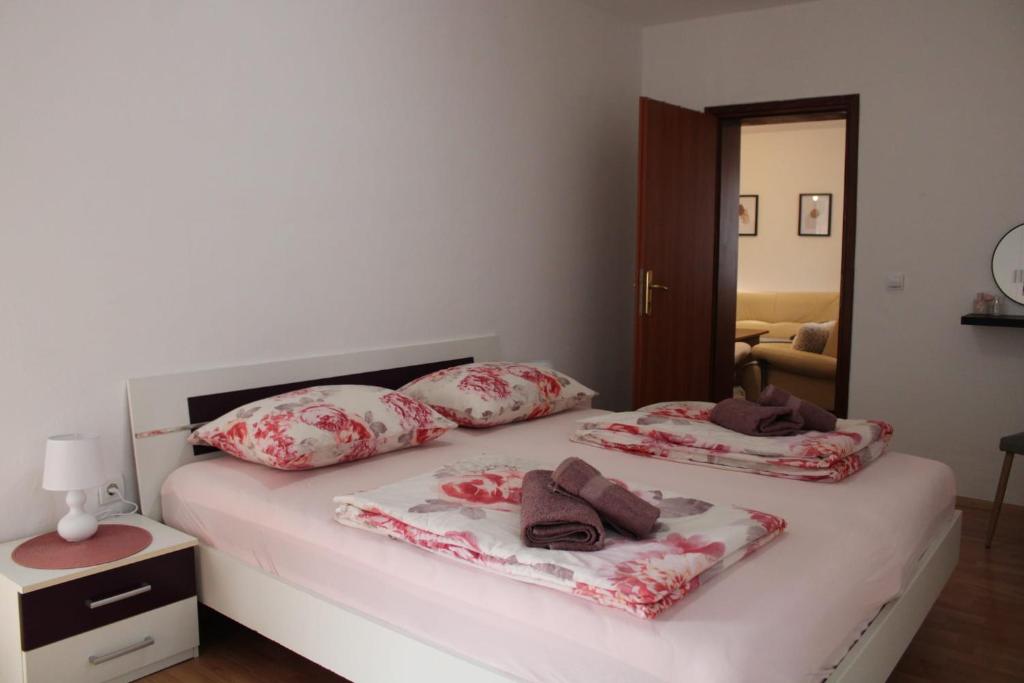 Postel nebo postele na pokoji v ubytování Apartman Villarossa