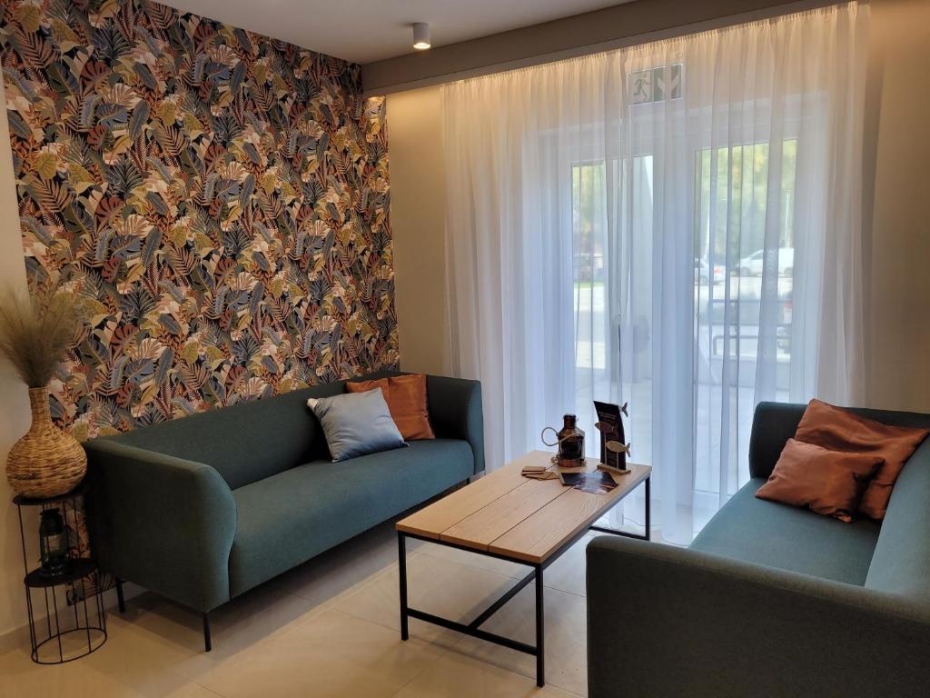 אזור ישיבה ב-Hotel Csillag Tokaj