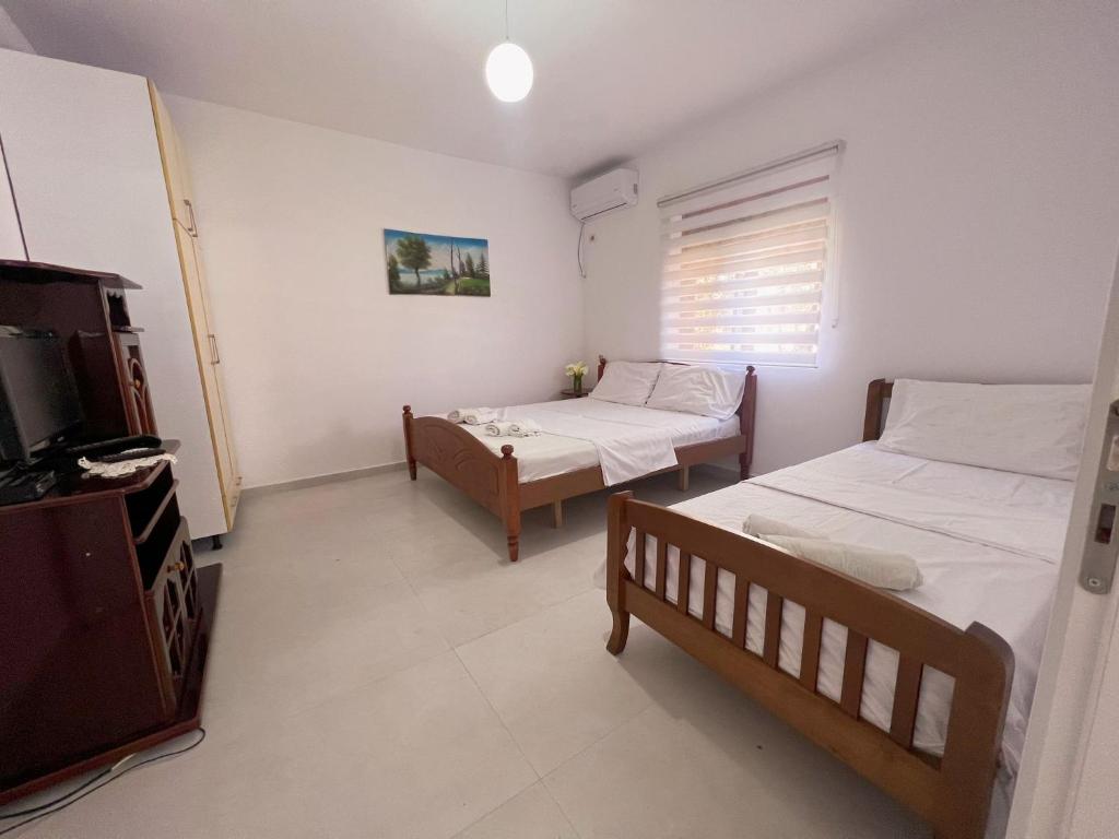 Postel nebo postele na pokoji v ubytování Kristel Holiday Home