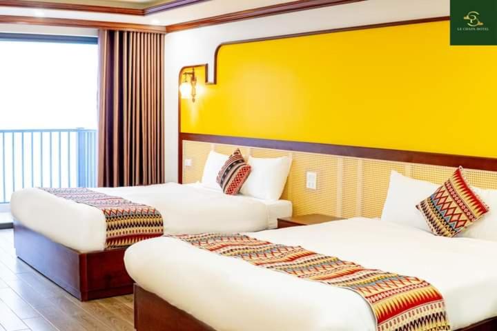Postel nebo postele na pokoji v ubytování Le Chapa Hotel & Spa