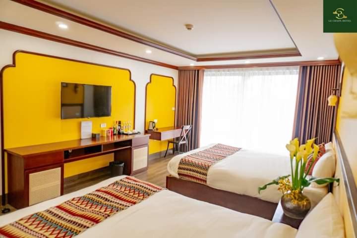 Postel nebo postele na pokoji v ubytování Le Chapa Hotel & Spa