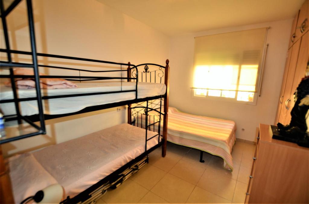 Posteľ alebo postele v izbe v ubytovaní Villa Brava 9 personas Lloret de mar