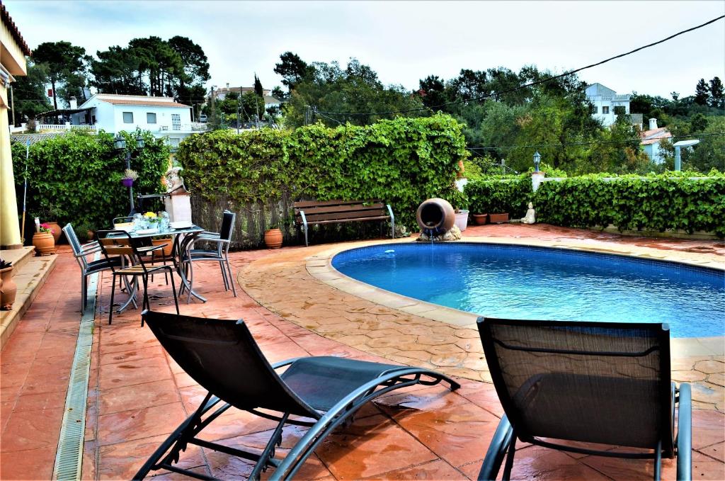 Bazén v ubytovaní Villa Brava 9 personas Lloret de mar alebo v jeho blízkosti