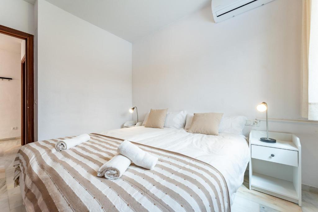 Postel nebo postele na pokoji v ubytování Apartamento Ramon y Cajal
