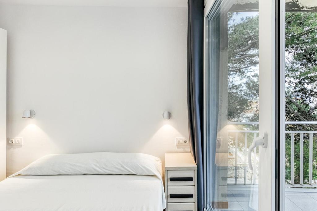 Posteľ alebo postele v izbe v ubytovaní Apt Pedrera 2 dormitorios