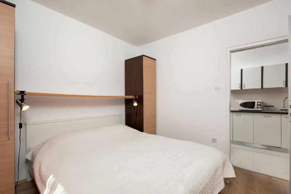 Kuchyňa alebo kuchynka v ubytovaní Apartments Mandić
