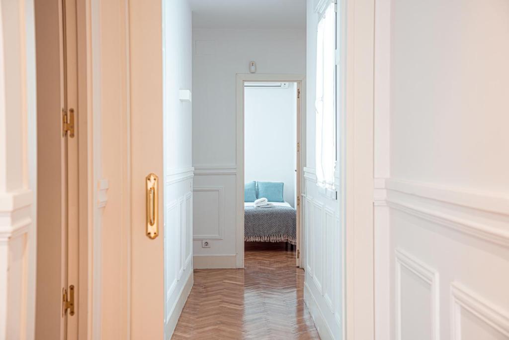 A bed or beds in a room at My City Home - Amplio apartamento en Salamanca