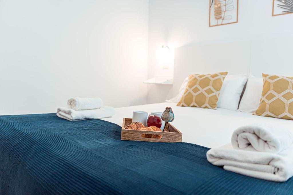 A bed or beds in a room at My City Home - Amplio apartamento en Salamanca