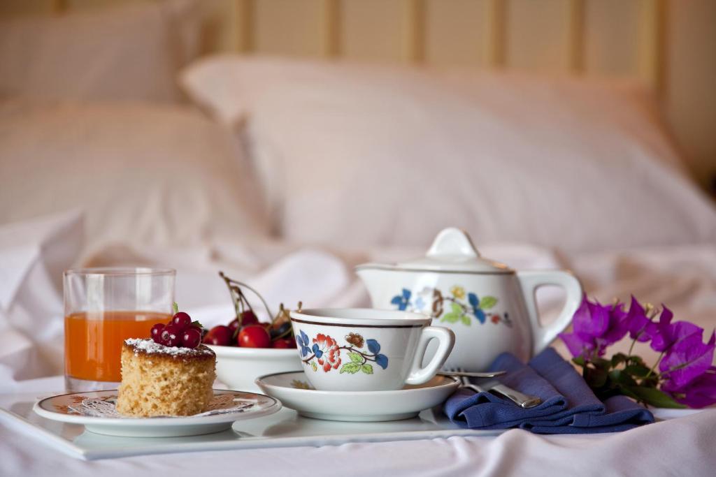 Una cama o camas en una habitación de Hotel Continental Mare
