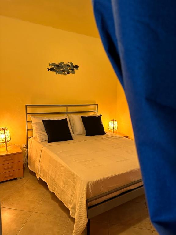 Posteľ alebo postele v izbe v ubytovaní Spiaggia Le Dune Residence