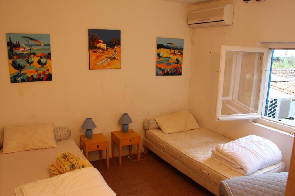 Posteľ alebo postele v izbe v ubytovaní Le Grau d'Agde: A vivre en famille et entre amis