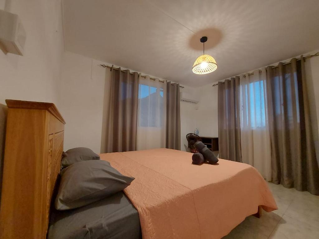 Postel nebo postele na pokoji v ubytování Oceanview Kite Studio