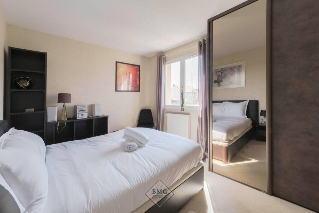Posteľ alebo postele v izbe v ubytovaní Golf House Disneyland BMYGUEST