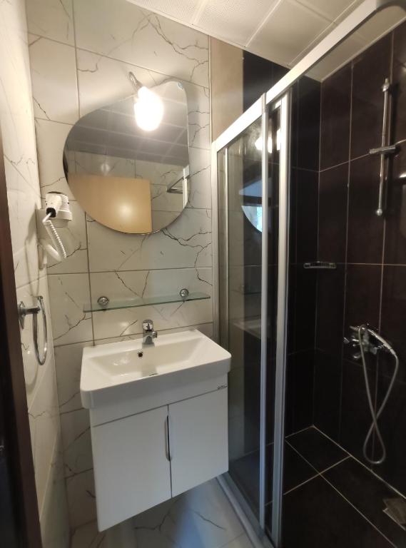 Koupelna v ubytování Wassermann Hotel