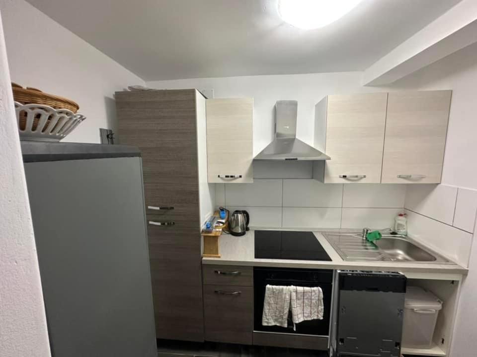 Kuchyň nebo kuchyňský kout v ubytování Apartments Stokic