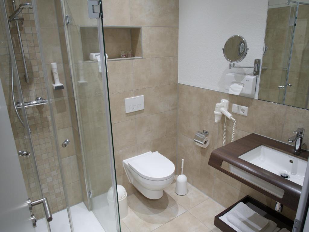 Koupelna v ubytování Hotel Greive