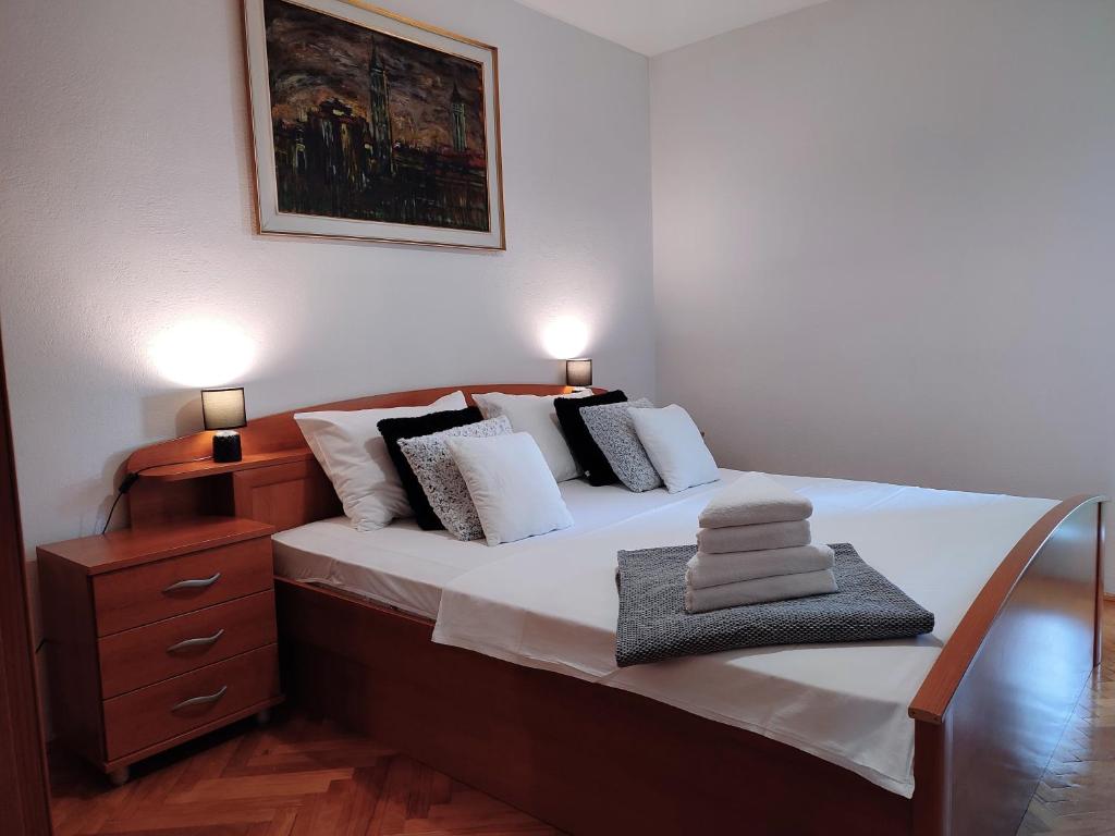Posteľ alebo postele v izbe v ubytovaní Deluxe Apartman Pervan