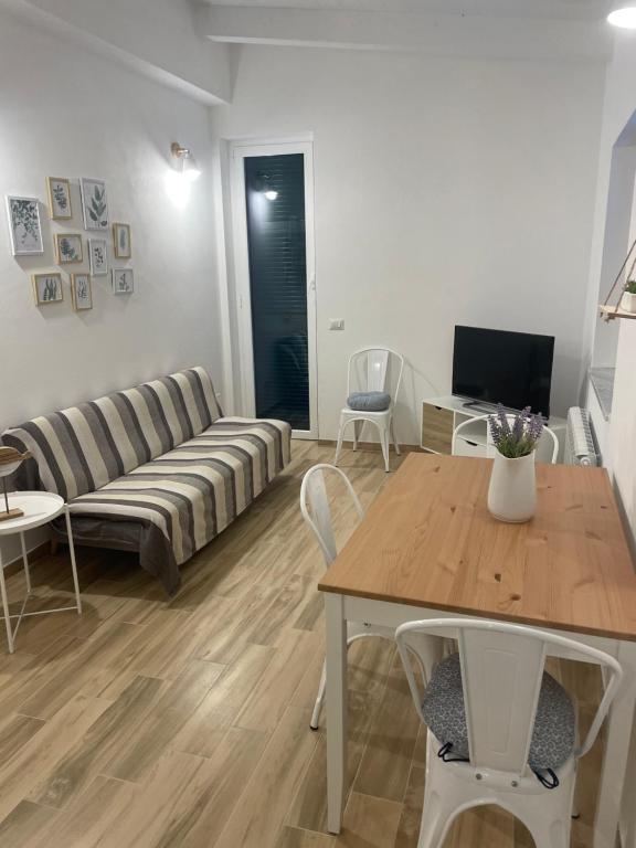 TV a/nebo společenská místnost v ubytování Cà di Giaco lodge