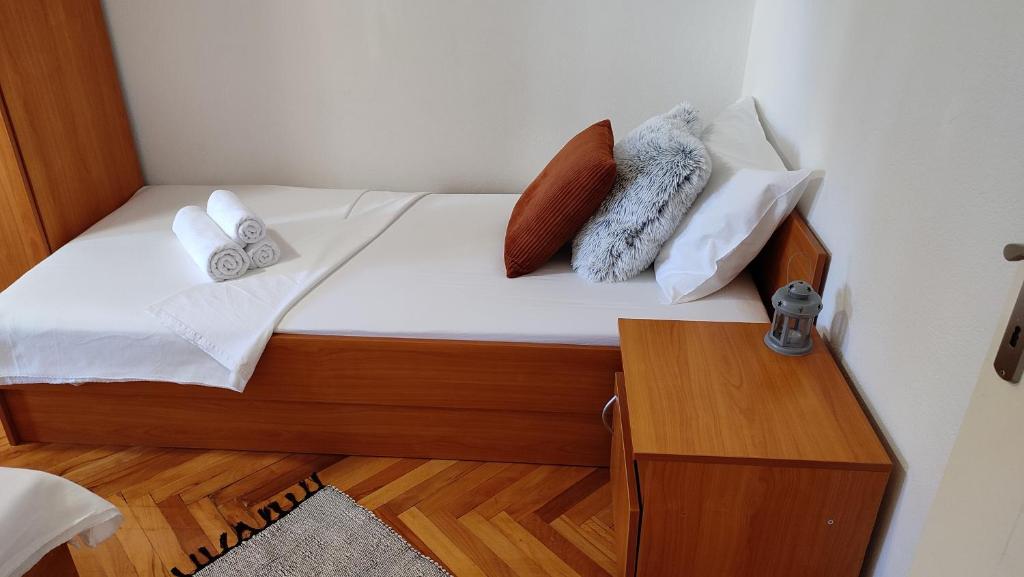 Posteľ alebo postele v izbe v ubytovaní Deluxe Apartman Pervan