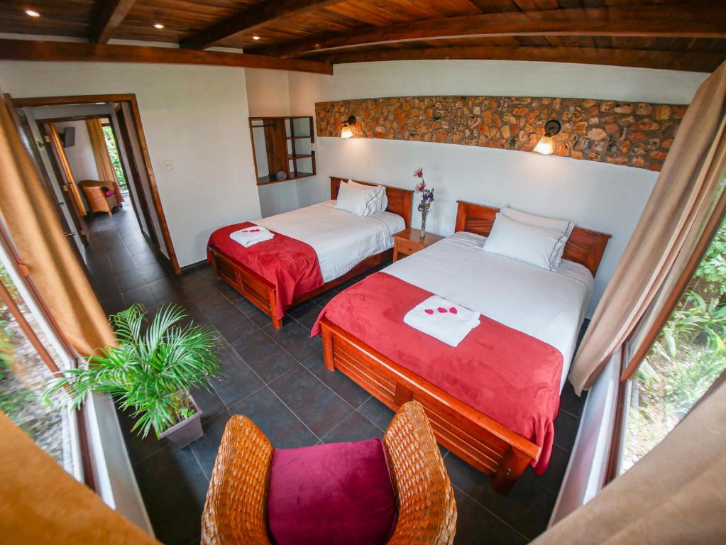 Postel nebo postele na pokoji v ubytování Coffee Lodge Cristal Glamping & Spa