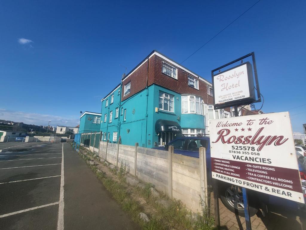 a building with a sign in front of it at The Rosslyn in Paignton