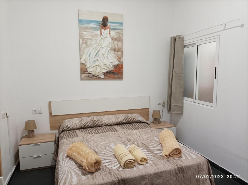 Postel nebo postele na pokoji v ubytování Casa La Isleta, entre el puerto y la playa Las Canteras