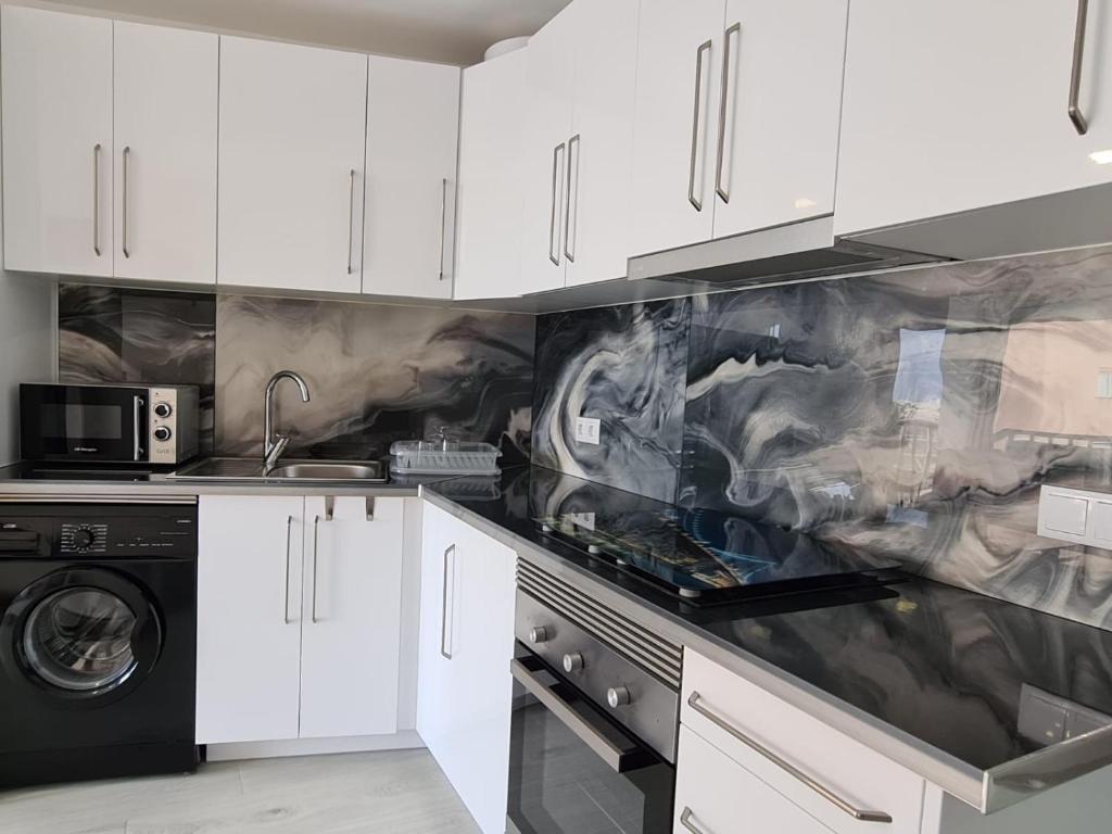 Kuchyň nebo kuchyňský kout v ubytování Apartamento Acacias IV 5 IF Benidorm