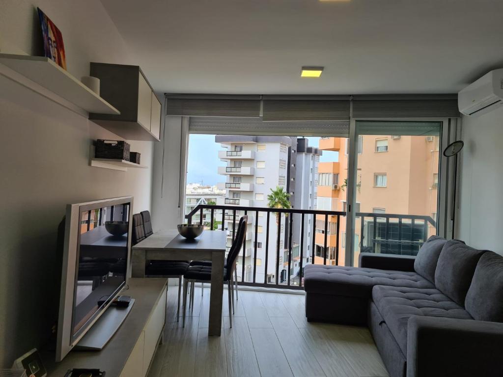TV a/nebo společenská místnost v ubytování Apartamento Acacias IV 5 IF Benidorm
