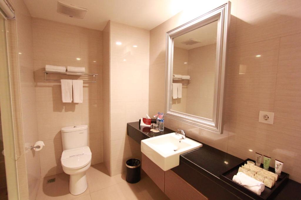 Baðherbergi á Pranaya Boutique Hotel